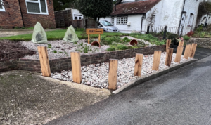 TH Fencing & Landscaping | What Does a Landscape Construction Company Actually Do for Homeowners? Professional landscapers installing hard and soft landscaping, fences, and outdoor garden features in West Sussex.