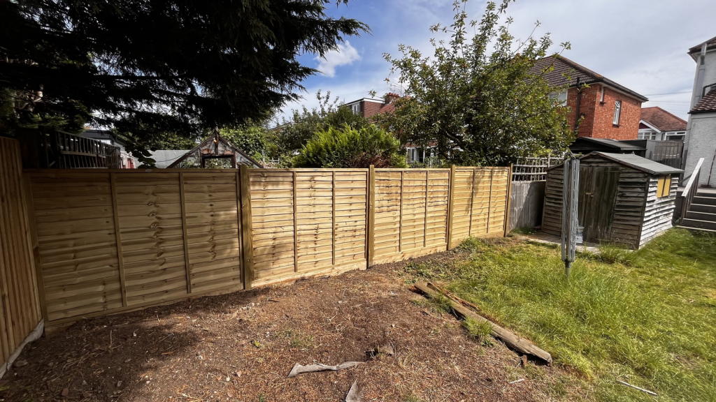 TH Fencing & Landscaping | Why Should You Choose a Local Fencing and Landscaping Company in West Sussex Local fencing and landscaping company working on a residential garden in West Sussex