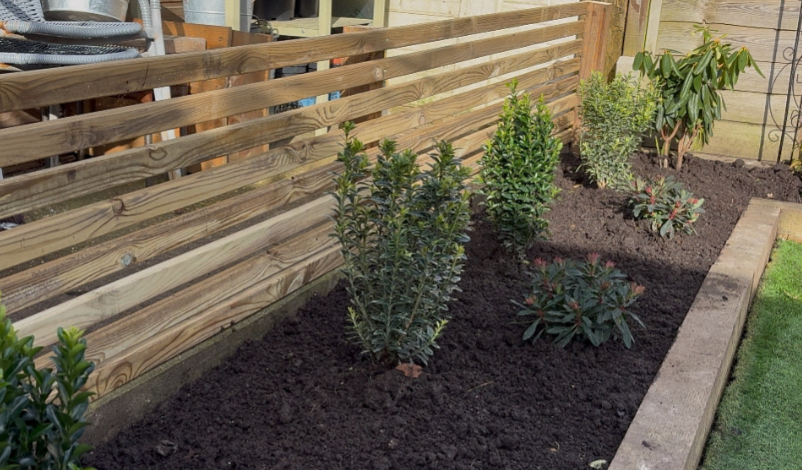 Garden fencing installation in a residential West Sussex garden